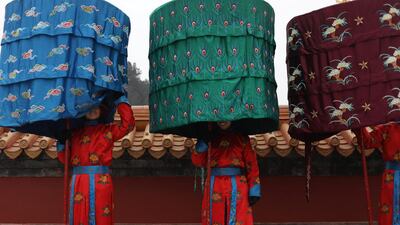 Chinese performers during a rehearsal ahead of the Lunar New Year events in Beijing. How Hwee Young / EPA