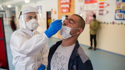A man from Lunik IX borough is administered the antigen test for Covid-19 in Kosice, Slovakia. Getty Images