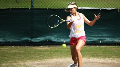 Eugenie Bouchard of Canada during a practice session on Day 11 of Wimbledon at the All England Lawn Tennis and Croquet Club on July 4, 2014, in London, England. Dan Kitwood / Getty Images