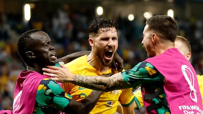 Mathew Leckie celebrates scoring against Denmark in the final Qatar 2022 World Cup Group D match at Al Janoub Stadium. Reuters