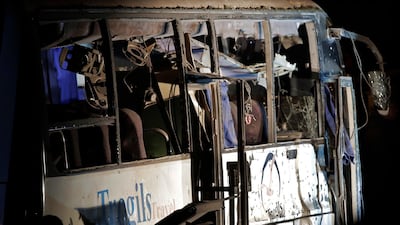 The damaged bus after a roadside bomb in an area near the Giza Pyramids in Cairo. AP Photo