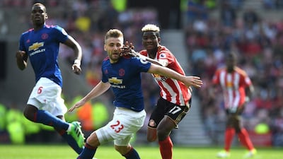 Luke Shaw of Manchester United, left, is challenged by Didier Ndong of Sunderland during the Premier League match at Stadium of Light on April 9, 2017 in Sunderland, England. Shaun Botterill / Getty Images