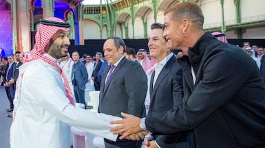 Saudi Crown Prince Mohammed bin Salman greets footballer Cristiano Ronaldo during the closing ceremony of the Esports World Cup, in Paris. Photo: Saudi Royal Court