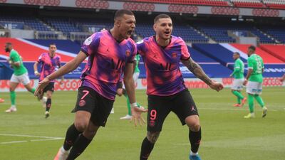 Paris Saint-Germain's Kylian Mbappe celebrates with Mauro Icardi after scoring a penalty in his team's 3-2 Ligue 1 victory over Saint Etienne at the Parc des Princes stadium on Sunday, April 18. EPA