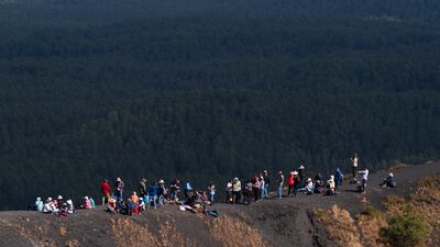 A group from an international vulcanology congress on the crater lip