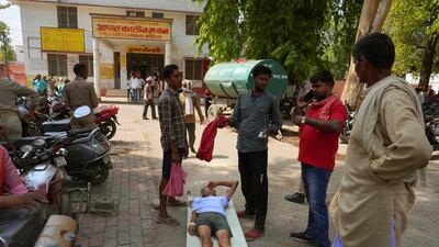 An elderly patient waiting to be admitted to hospital in Ballia