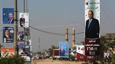 This picture taken on April 24, 2018, shows electoral posters ahead of the parliamentary elections to be held on May 12, in Fallujah. Ahmad Al-Rubaye / AFP