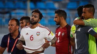 The UAE, in white, have been eliminated from the Beach Soccer World Cup after extra-time defeat to Portugal. Courtesy Lea Weil