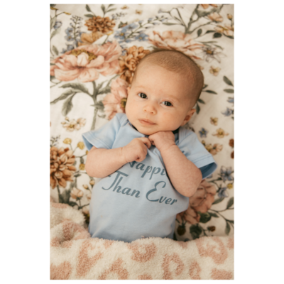 'Happier than ever' baby grow, Dh122, by Billie Eilish. Photo: Universal Music Group