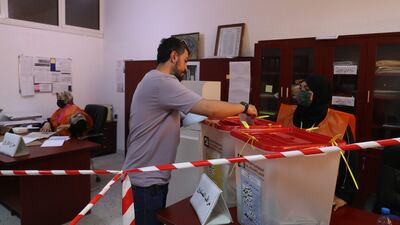 A Libyan voter casting his ballot for municipal elections at a polling station in Tripoli in August. AFP