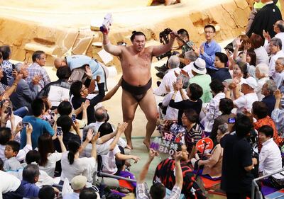The likes of Hakuho have tended to keep their celebrations in public to the minimum. Reuters