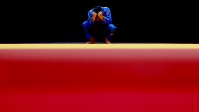 Silver medallist Shakhram Ahadov after being defeated in the judo final against the UAE’s Kazbek Naguchev, at the Asian Games in Nagoya, Japan. Reuters