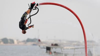 Lindsay McQueen of Spain takes part in the Flyboard world championship semi-final in Doha October 20, 2012. REUTERS/Fadi Al-Assaad (QATAR - Tags: SPORT)