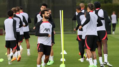 Liverpool striker Mohamed Salah training with teammates. AFP