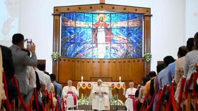 This handout photo released by the Vatican Media shows Pope Francis attending a prayer meeting at the Sacred Heart Church in the Bahraini capital Manama. AFP