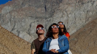 Chileans watch the sky prior to the total solar eclipse in Paiguano, Chile. Getty Images