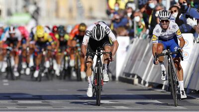 Julian Alaphilippe crosses the finish line to win Stage 2. EPA