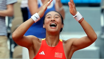 Qinwen Zheng of China celebrates after winning her semi-final against Iga Swiatek of Poland 6-2, 7-5 at the Paris 2024 Olympics at the Roland Garros stadium on August 1, 2024. EPA