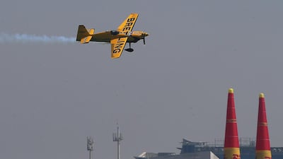 Pilots take their practice runs yesterday over the Breakwater in Abu Dhabi. Ravindranath K / The National