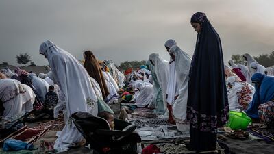 Muslims perform Eid Al Fitr prayer at Parangkusumo beach in Yogyakarta, Indonesia.
