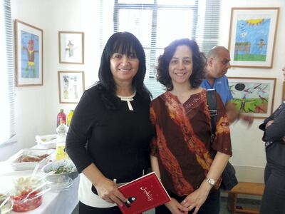 Haifa-area school librarian Elham, left, with Melissa Morrone, right, of Librarians and Activists, which founded the Matloub project