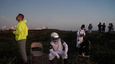 Spectators gathered on South Padre Island to watch the launch near Brownsville, Texas. Reuters