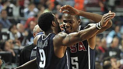 Kevin Durant, right, celebrates with Andre Iguodala after the US team won the FIBA World Championship final match against Turkey.