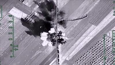 A Russian air strike targets a convoy near Aleppo, Syria. (Russian Defense Ministry Press Service / AP)