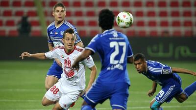 Rodriguinho Marinho (no 88 in white) of Sharjah in action during the Arabian Gulf Cup final at Rashid Stadium in Dubai. Pawan Singh / The National