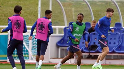 England's Raheem Sterling, second right, at training.