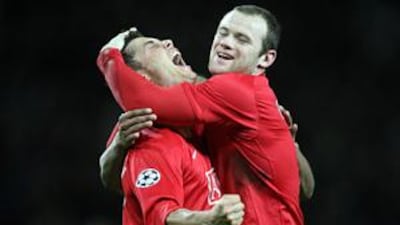 Ronaldo, left, and Wayne Rooney have increasingly swapped roles in Manchester United's line-up.