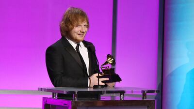 Ed Sheeran accepts the award for best pop solo performance for 'Thinking Out Loud' at the 58th annual Grammy Awards in Los Angeles. A