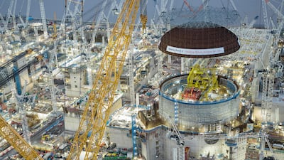 A dome is lifted into place at Britain's Hinkley Point C site, a nuclear plant under construction with the help of the world's largest crane Big Carl. AFP