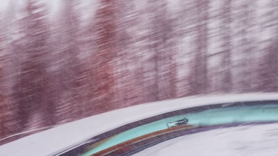 Jekabs Kalenda of Team Latvia pilots his team in heat four of four-man bobsleigh training on day 13 of the Milano Cortina 2026 Winter Olympic games at Cortina Sliding Centre on February 19, 2026 in Cortina d'Ampezzo, Italy