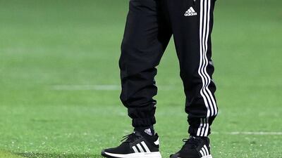 Sharjah manager Abdulaziz Al Anbari watches on from the touchline. Chris Whiteoak / The National