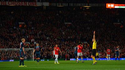 Referee Carlos Velasco Carballo shows Bastian Schweinsteiger of Bayern Munich a red card during the 1-1 draw between Bayern and Manchester United in the Champions League quarter-final first leg at Old Trafford on Tuesday night. Michael Regan / Bongarts / Getty Images / April 1, 2014