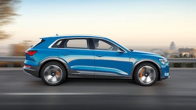 The e-tron is a sporty full-size SUV. Audi