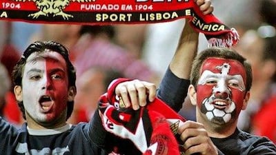 Benfica's fans celebrate the goal against Sporting during their Portuguese Premier League match held at Light stadium in Lisbon May 14, 2005. Benfica won 1-0. REUTERS/Jose Manuel Ribeiro JR/dh
