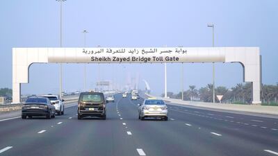 Early morning sun at Sheikh Zayed Bridge going to downtown Abu Dhabi. Victor Besa/The National