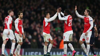 Alexis Sanchez and Arsenal teammates celebrate during their win on Tuesday night in the Champions League. Matthew Childs / Action Images / Reuters