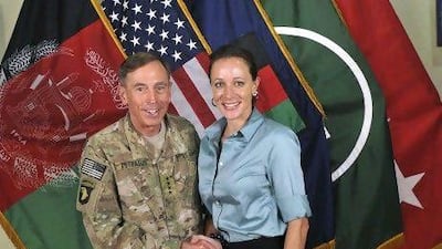General David Petraeus shakes hands with biographer Paula Broadwell in this military photo originally posted on July 13, 2011.