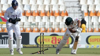Pakistan's Abdullah Shafique is bowled out by England's Jack Leach for seven. AP