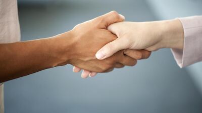 The decision in Switzerland to impose fines on young students who fail to shake hands with their schoolteachers has raised issues around multiculturalism in Europe yet again. Getty Images