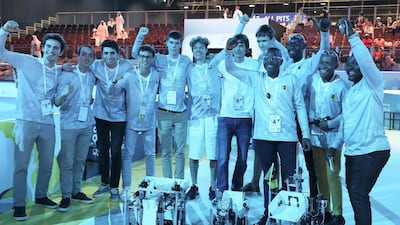 Members of Italy and Cameroon react to hearing their competition score..