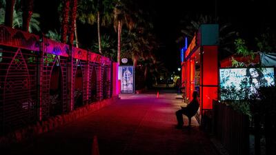 A security guard is seen outside a restaurant in the tourist area of Naama Bay.