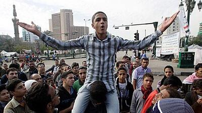 gyptians demand the military relinquishes its power in a protest in Cairo yesterday.