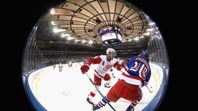 Justin Abdelkader, left, of the Detroit Red Wings and New York Rangers's Artemi Panarin during their NHL clash at Madison Square Garden. AFP