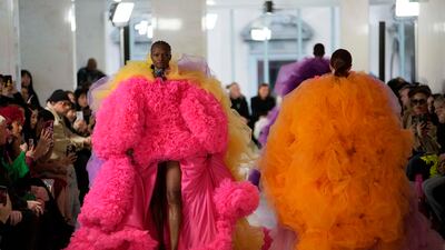 Colourful looks in Tomo Koizumi's autumn/winter 2023 collection. AP