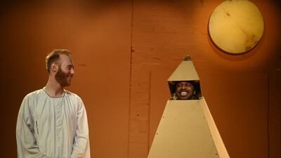 Actors Mohand Hasb Alrosol Abdalrahem, right, and Peter Pearson perform the play 'Mohand and Peter' during a photocall at the Southwark Playhouse in London on Wednesday. It has been staged by PSYCHEdelight theatre company, which creates theatre by refugees. The show recalls Abdalrahem's life as a Sudanese man who sought asylum in the UK. EPA