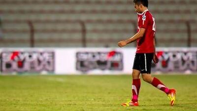 Al Ahli's Luis Antonio Jimenez walks off the pitch after being issued a red card during the second half of their round 12 Etisalat Pro-League match against Al Jazira at Rashid Stadium in Dubai on January 22, 2012. Al Ahli went on to a 2-1 victory. Christopher Pike / The National